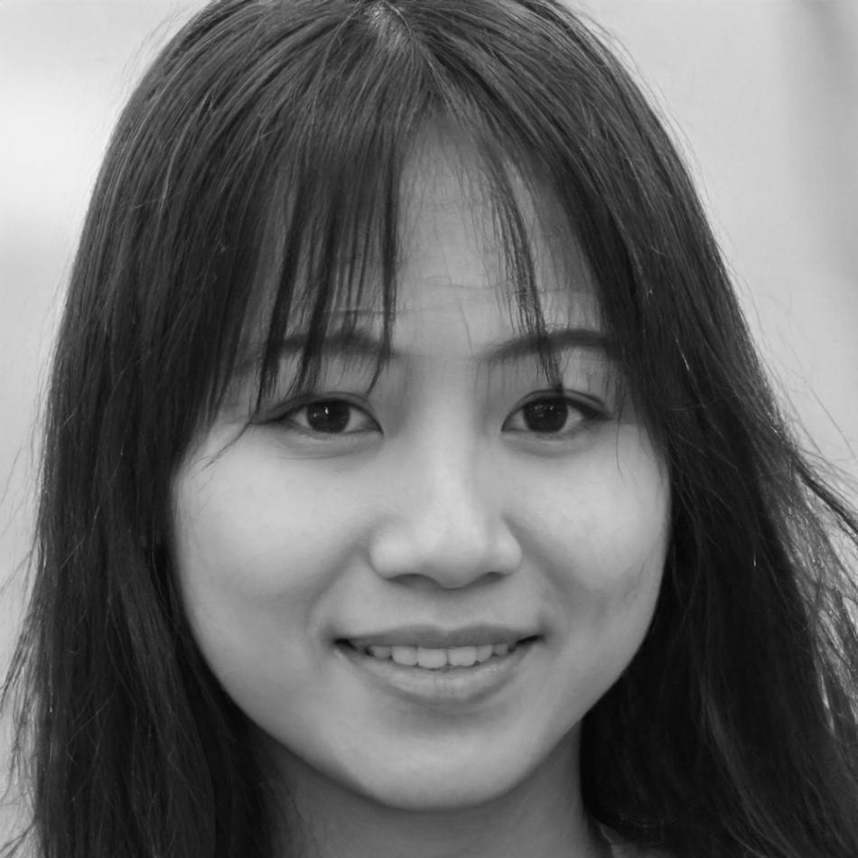 Professional headshot of financial education specialist with warm, approachable expression