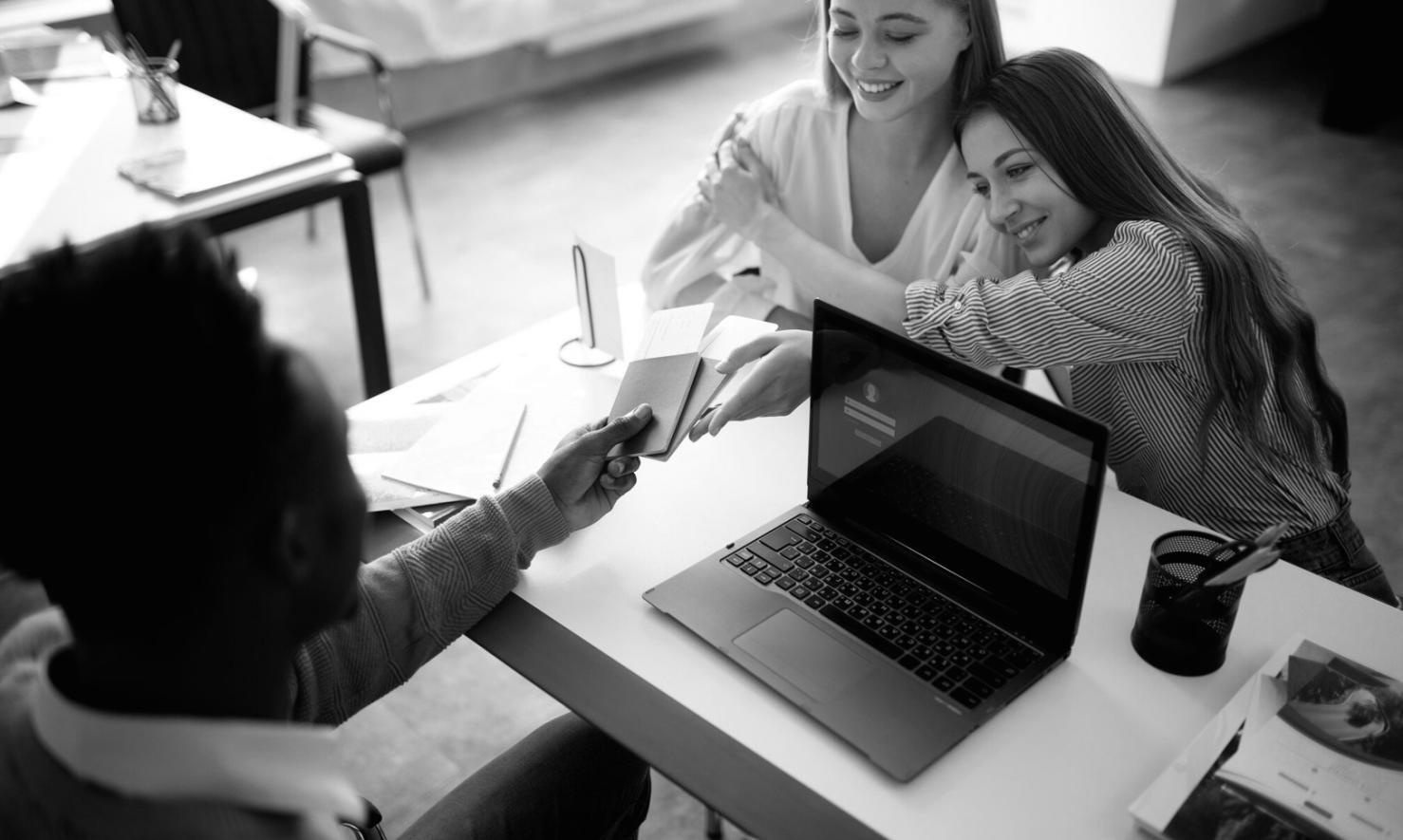 Financial planning workspace with calculator, charts, and business documents